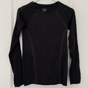Athleta  XS black and silver sparkle long sleeve shirt. Like new.